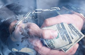 KNM Group Directors Fined for Malaysian Fraud A gavel and stack of Malaysian ringgit notes on a desk, symbolizing financial fraud penalties in Southeast Asia.