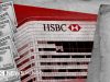 HSBC Flagged in $2 Trillion FinCEN Files Money Laundering Leak Close-up of HSBC signage with document overlay showing redacted suspicious activity report.