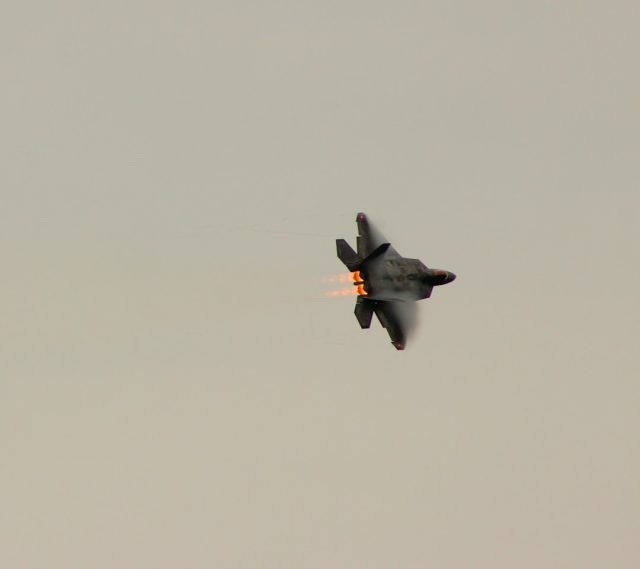 Singapore Air Force Grounds F-16 Fleet After Tengah Crash, Pilot Hospitalized An RSAF F-16C fighter jet sits on a runway at Tengah Air Base, surrounded by emergency vehicles after a crash during takeoff.