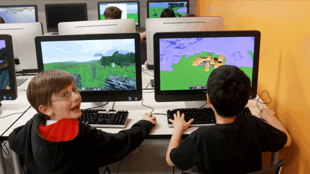 Child Playing Minecraft On A Computer