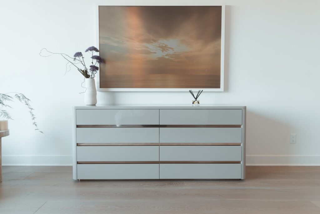 A child's bedroom with an unanchored IKEA Malm dresser against a wall, highlighting furniture tip-over risk.