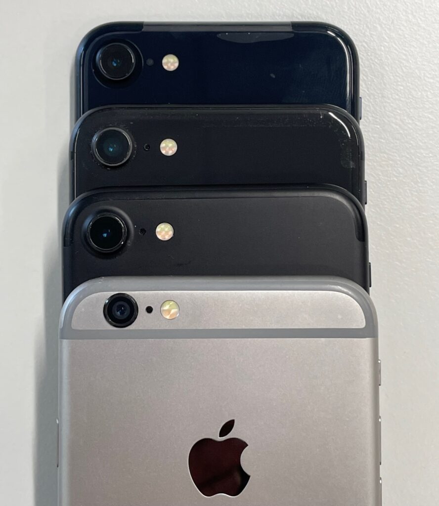 A hand holds the latest iPhone 17 Pro Max against a backdrop of glowing global sales counters ticking past 3 billion units.